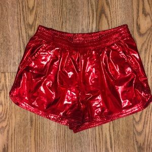 Red shiny shorts